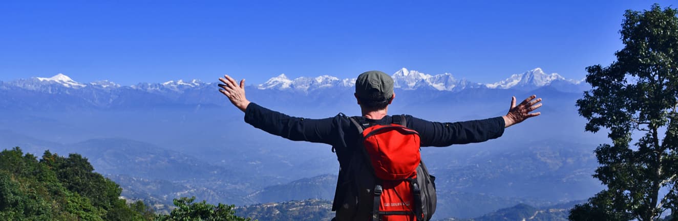Panoramic sunrise view of Himalayan peaks from Nagarkot ridge trail