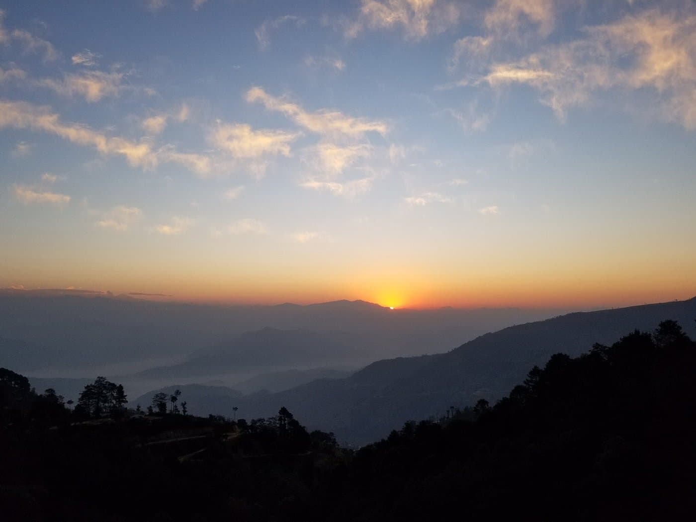 Golden light over the Himalayas from the Nagarkot ridge at dawn