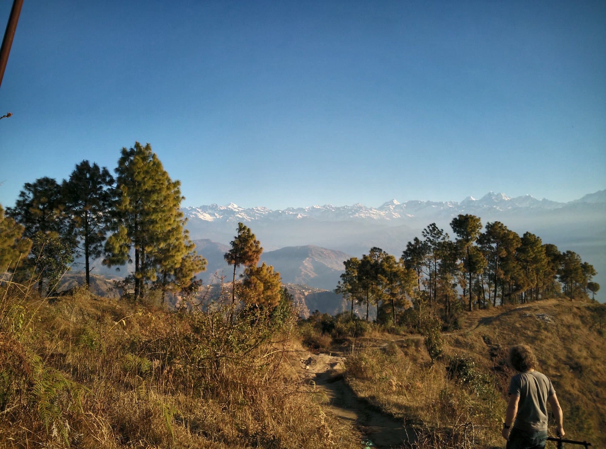 Nagarkot Panoramic Hiking Trail ridge with Himalayan backdrop near Kathmandu