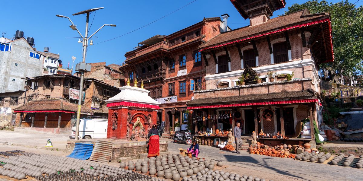 Pottery Square in Bhaktapur — traditional wheels and terracotta drying in the sun